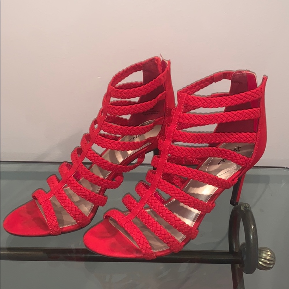 Strappy red heels